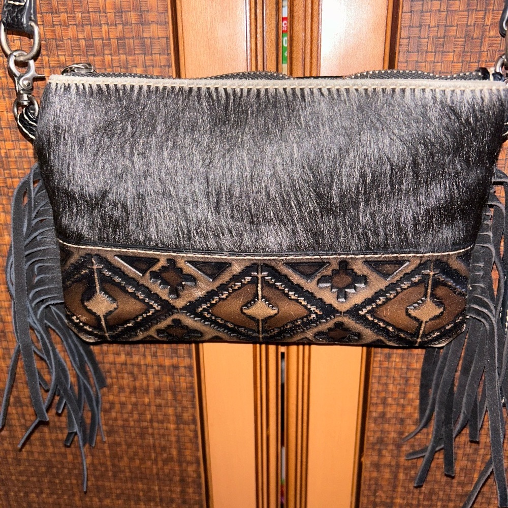 Chic Black and Brown Crossbody Bag with Fringe